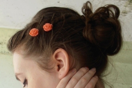 Brown Hair In Loose Messy Bun With Flower Barrettes Careforhair