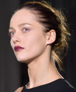 Elle Anthony Vaccarello Disheveled Bun Hairstyle