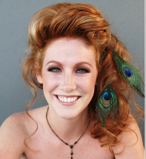 Long Auburn Hair In Formal Half Updo With Peacock Feathers