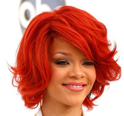 Rihanna Playful Curly Red Layered Bob Hairstyle With Side Bangs