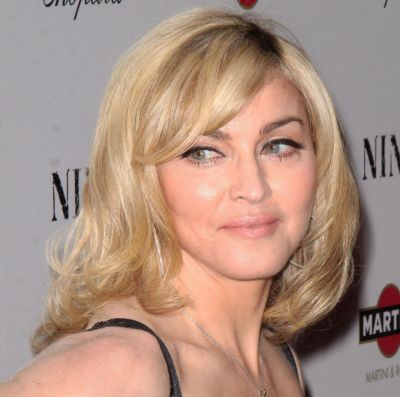 Mature sexy uk Madonna Blonde Hair In Sexy Medium Wavy Mature Hairstyle Careforhair Co Uk Careforhair Co Uk